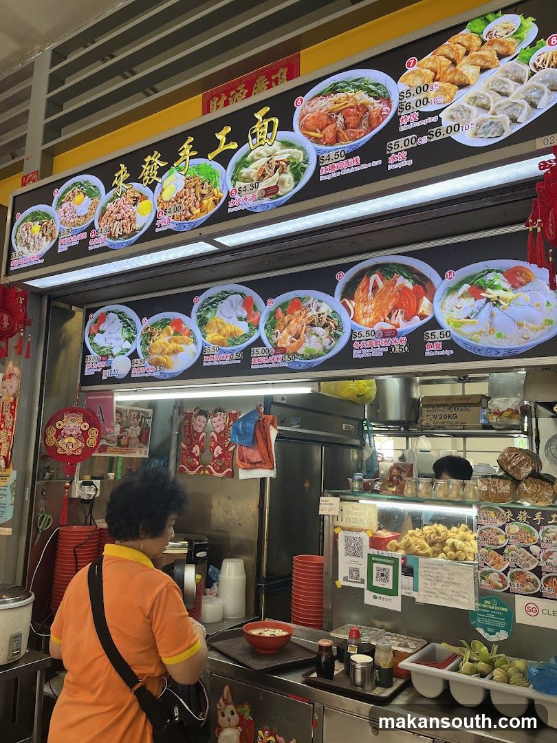 Food stall interior with customer and display