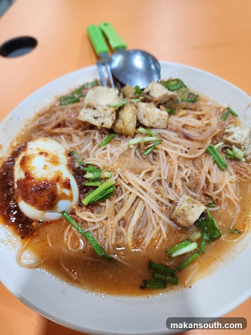 Noodle Dish with Fried Egg and Tofu