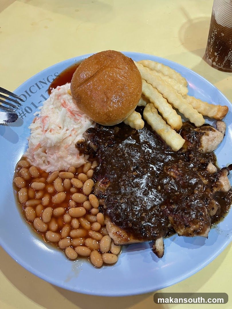 Plate of Food with Burger, Fries, Beans and Coleslaw