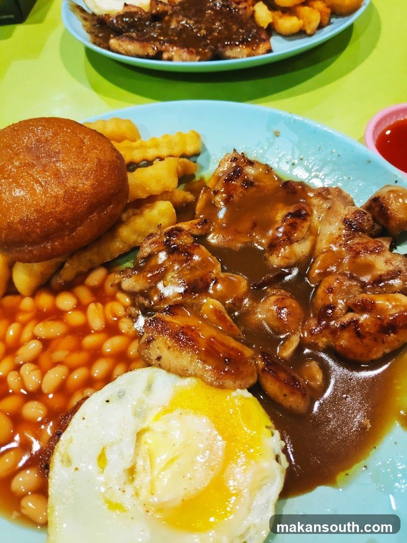 Chicken Rice Plate with Fried Egg and Fries