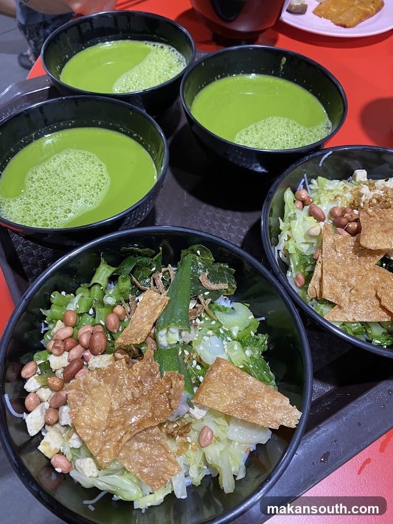 Food Tray with Green Soup and Rice Bowl