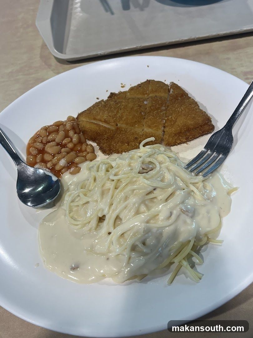 Plate of Pasta with Fried Chicken and Baked Beans