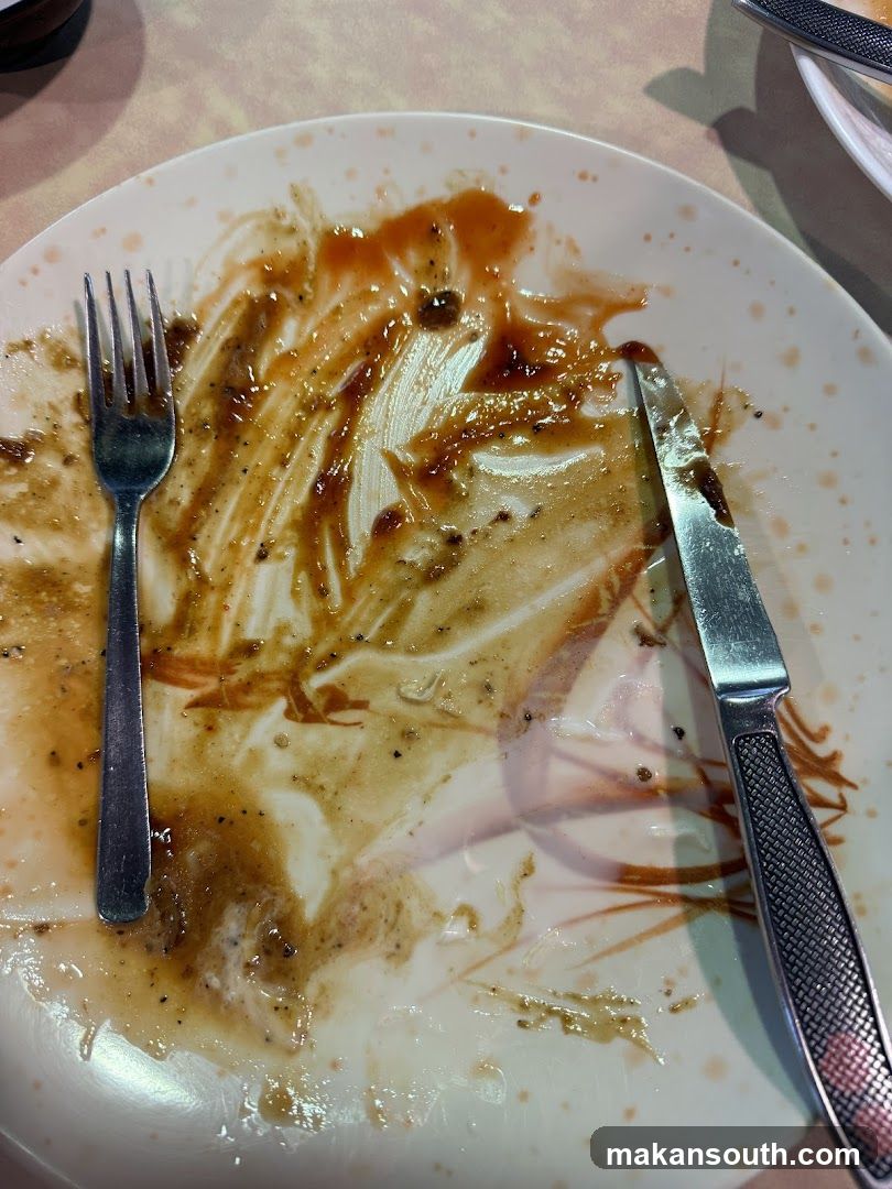 Empty Plate with Sauce Stains