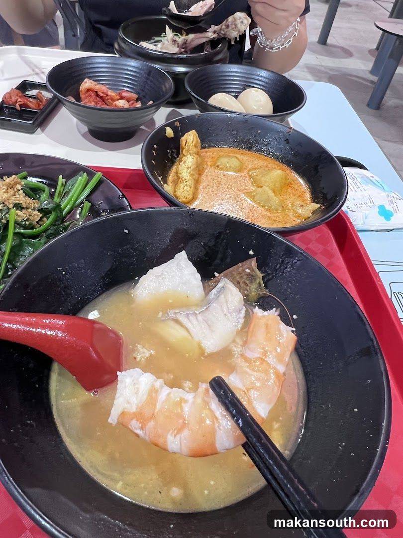 Food Tray with Bowls of Soup and Side Dishes