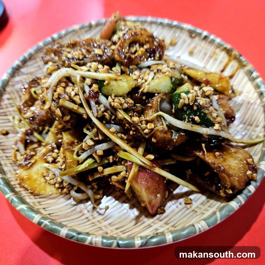Spicy Stir-fried Noodles with Vegetables and Sesame Seeds