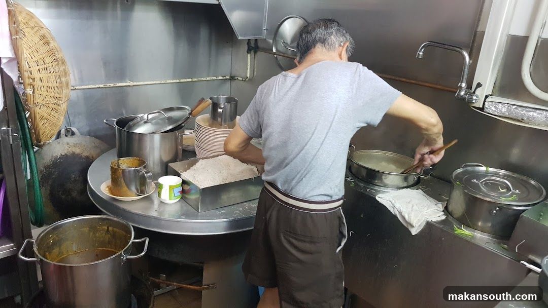 Kitchen Interior with Staff Cooking