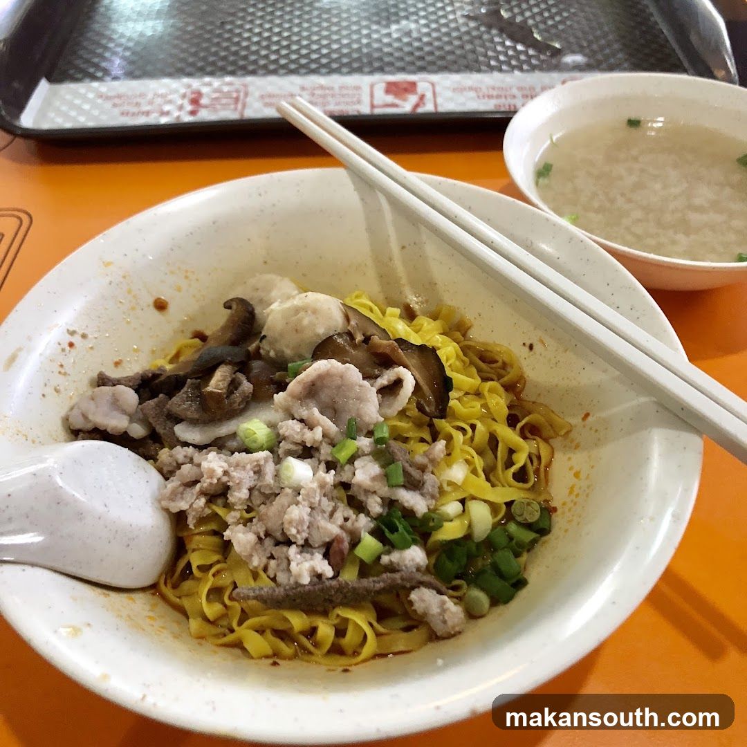 Noodle Bowl with Chopsticks and Porridge