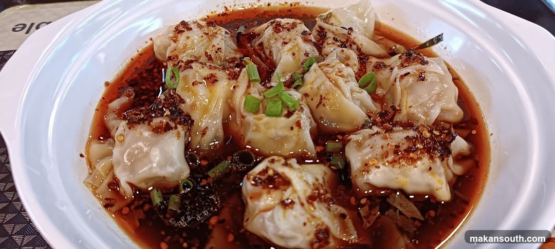 Spicy Dumplings in Red Sauce