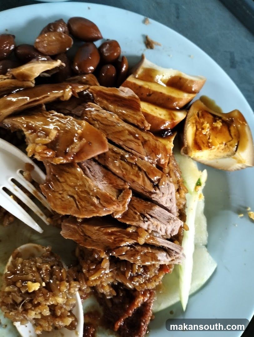 Plate of Roasted Meat and Side Dishes