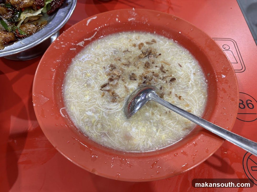 Bowl of congee with toppings