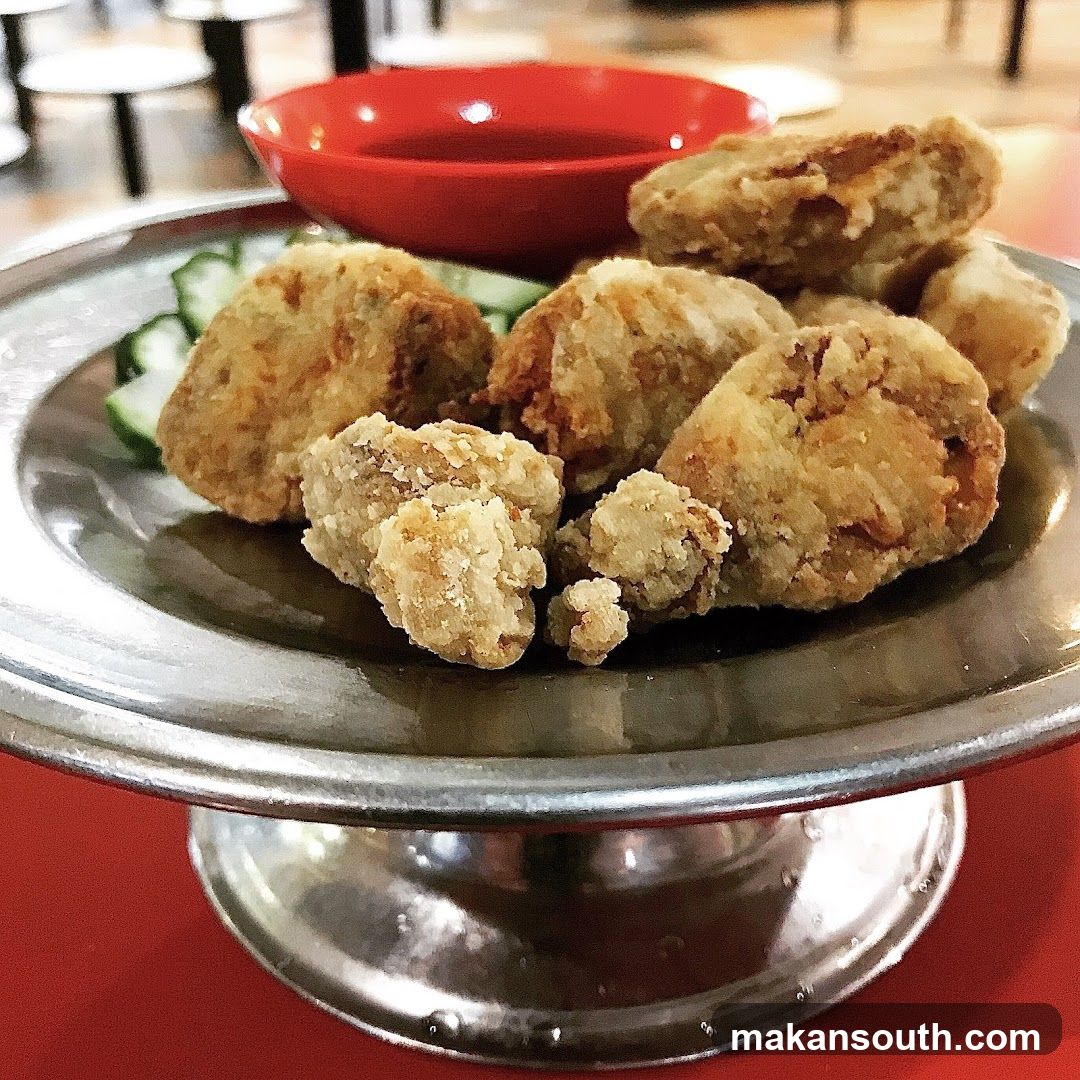 Fried Chicken with Cucumber and Sauce