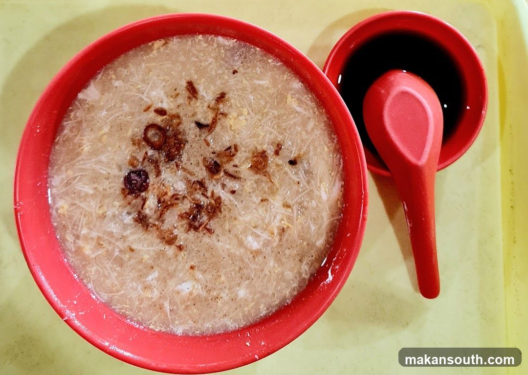 Red Bowl of Porridge with Soy Sauce