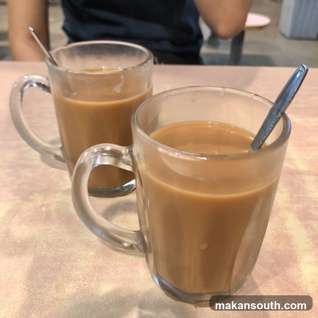 Two glasses of coffee on a table