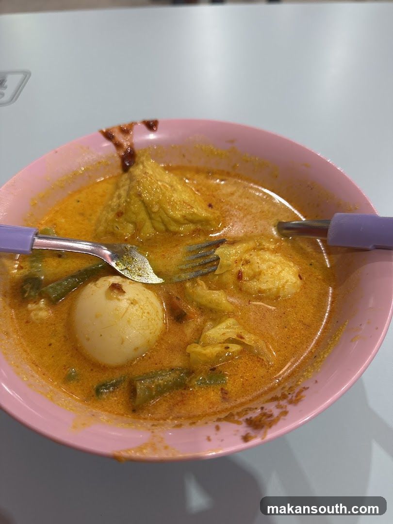 Bowl of Curry with Egg and Vegetables
