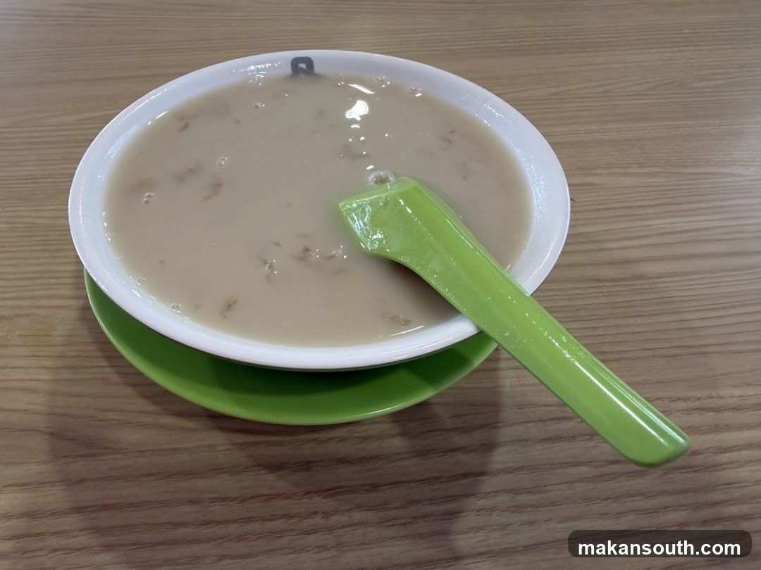 Bowl of Soup with Spoon