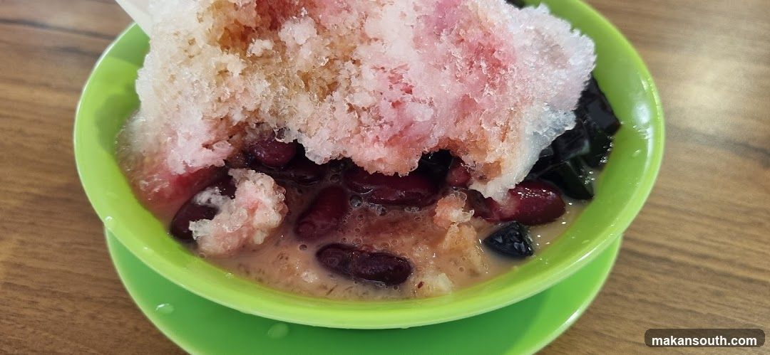 Bowl of shaved ice dessert with red beans and jelly