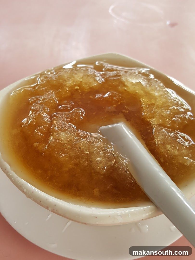 Bowl of Honeyed Dessert with Spoon