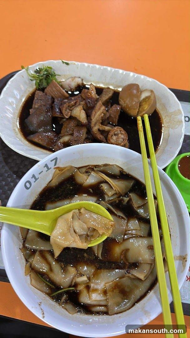 Bowl of noodles with side dish