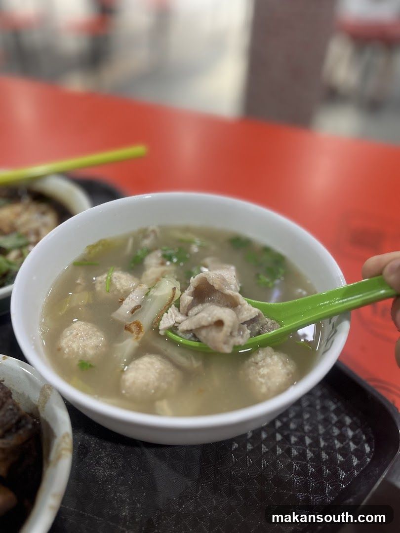 Bowl of Soup with Meatballs and Tofu