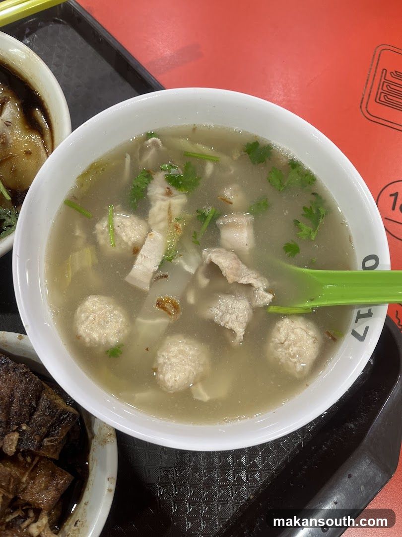Bowl of Soup with Meatballs and Pork
