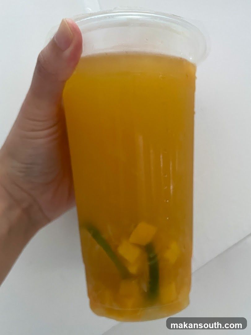 Mango Juice with Fruit Pieces