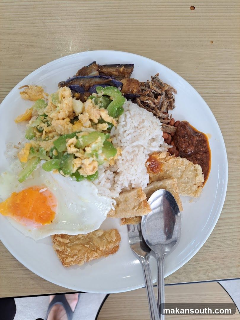 Plate of Fried Rice with Side Dishes