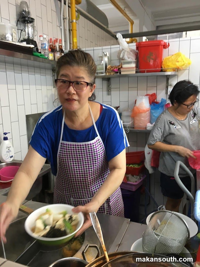 Kitchen Staff Preparing Food