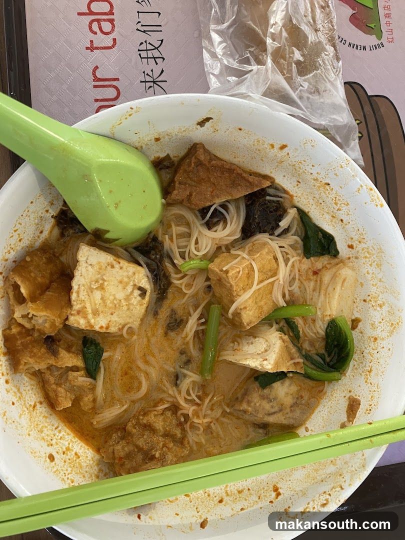 Bowl of Noodle Soup with Tofu and Greens