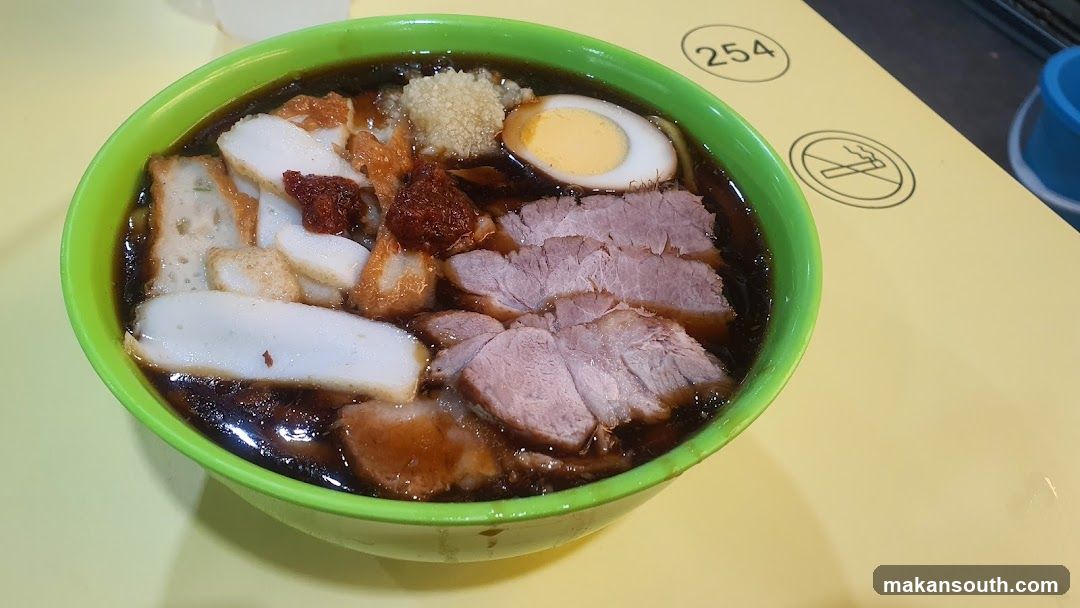 Bowl of Noodle Soup with Toppings