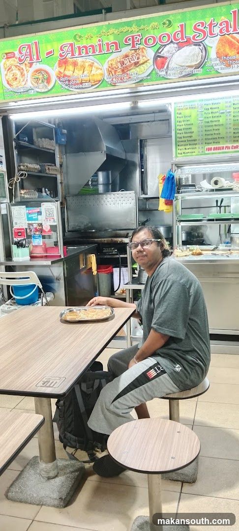 Food Stall Interior with Customer