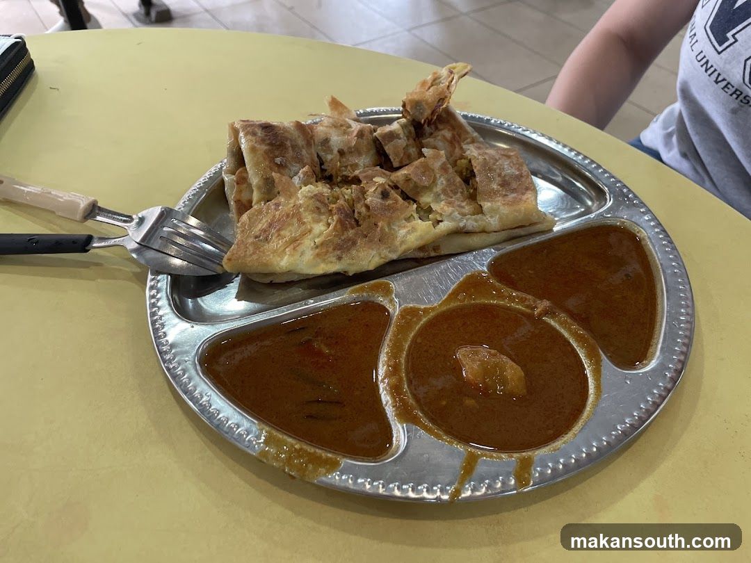Plate of Roti Canai with Curry