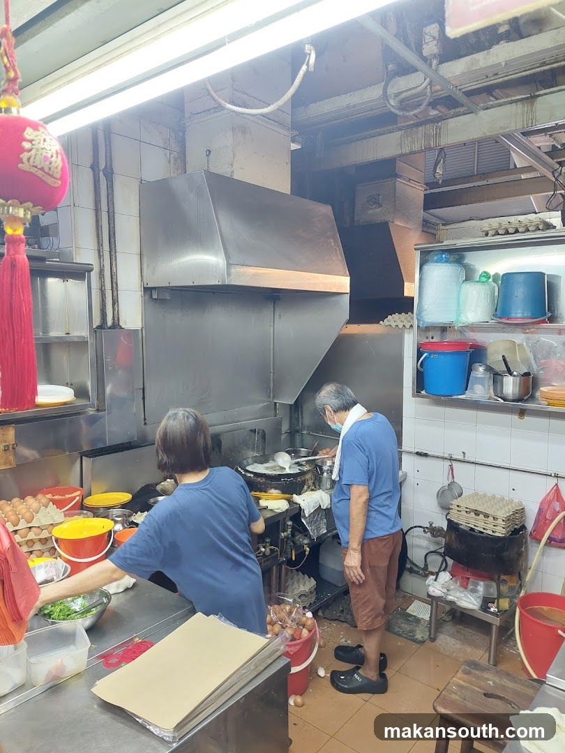 Kitchen Interior with Staff Cooking