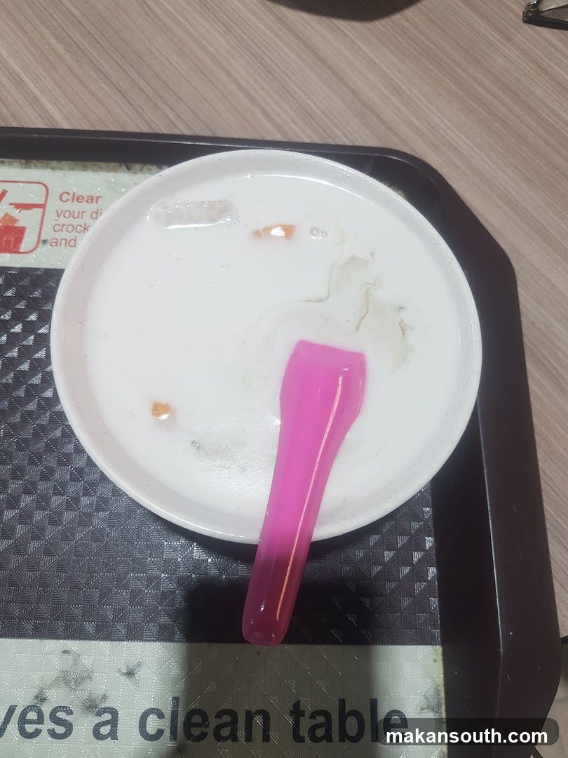 Empty Bowl with Pink Spoon on Tray