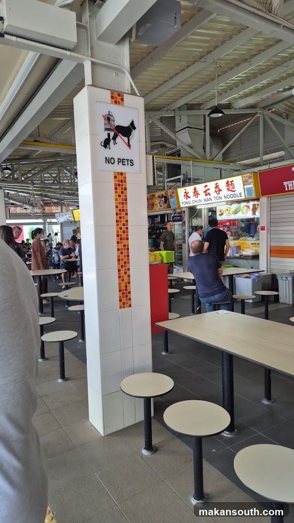 Food Court Interior with 'No Pets' Sign