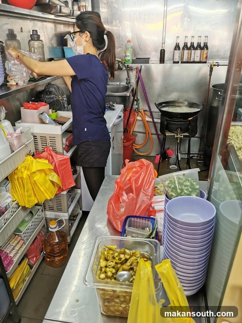 Kitchen Interior with Staff Preparing Food