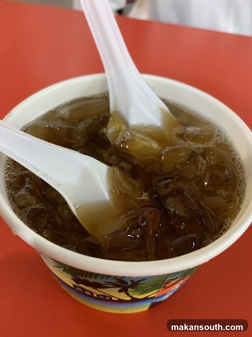 Bowl of Iced Jelly Dessert with Spoons