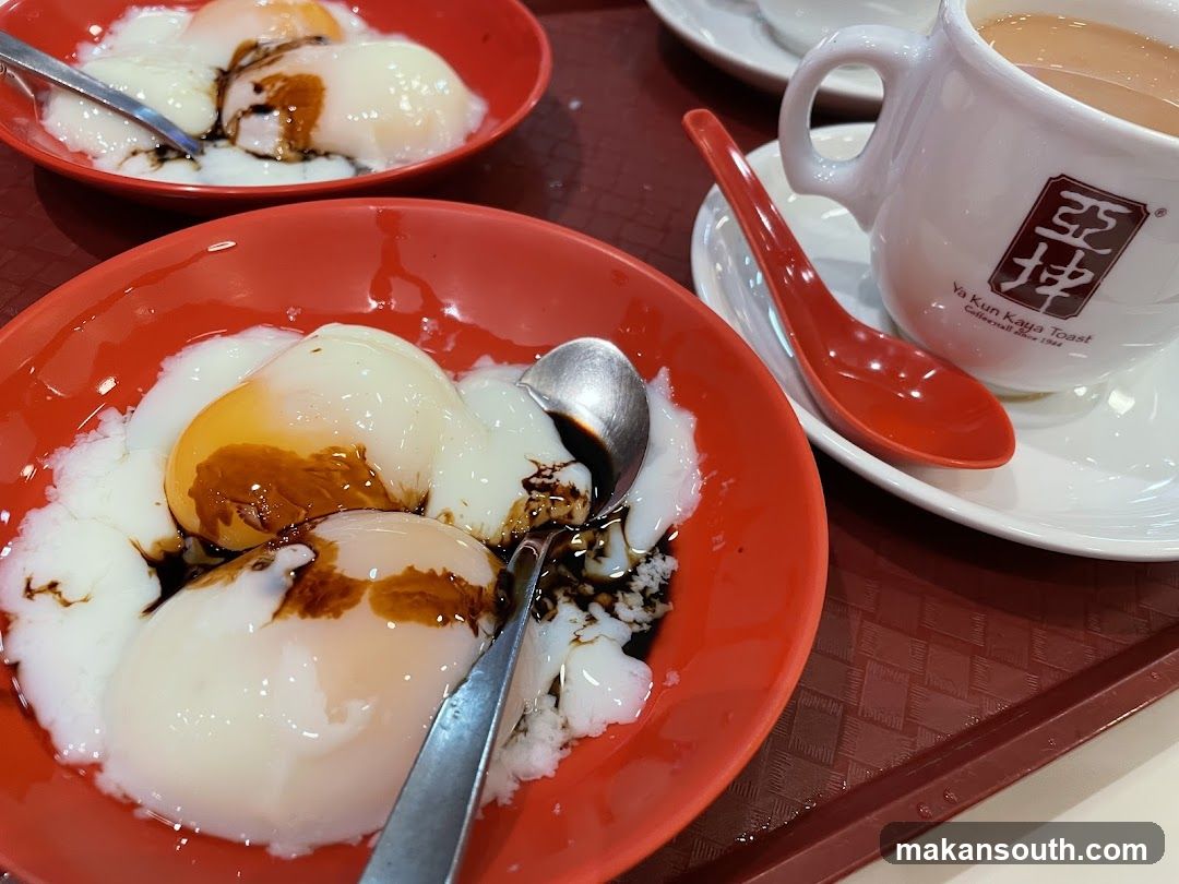 Soft-boiled eggs with soy sauce and toast