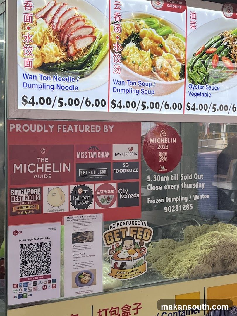 Food stall display with menu and branding