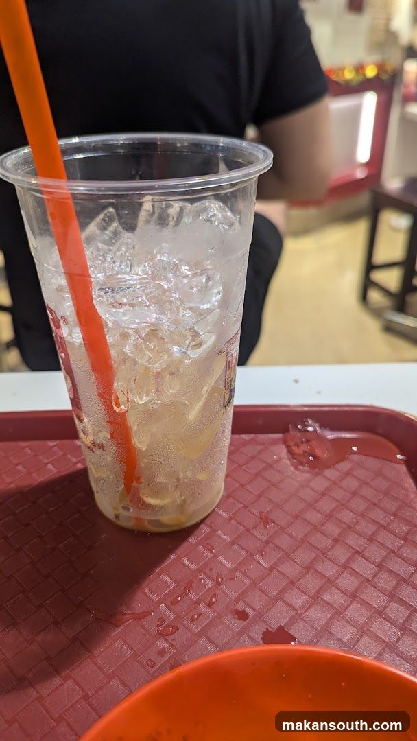 Iced Drink with Straw on Tray