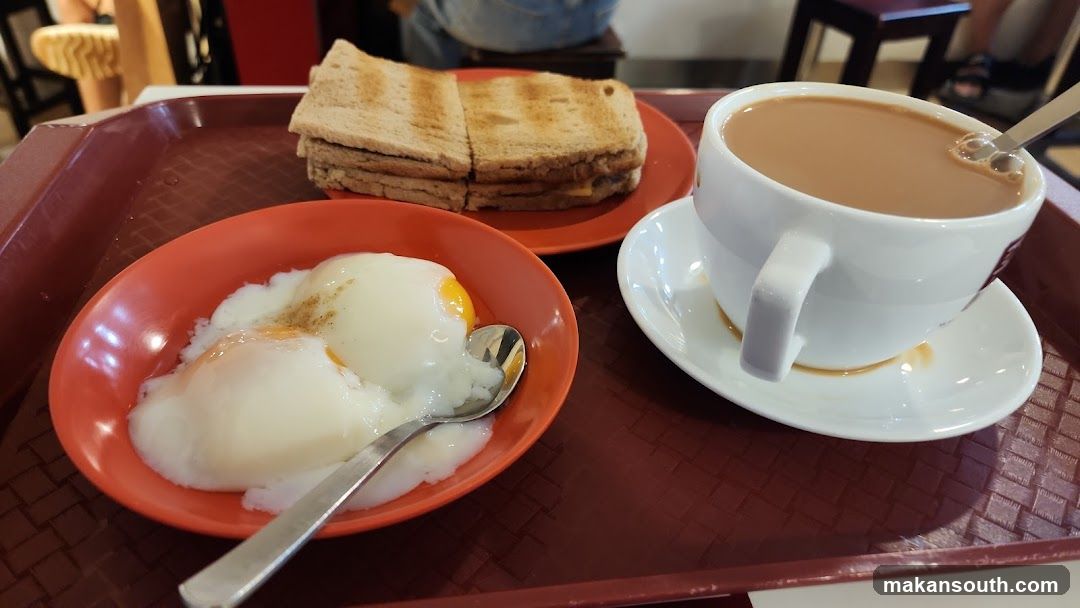 Breakfast Tray with Toast, Eggs and Coffee