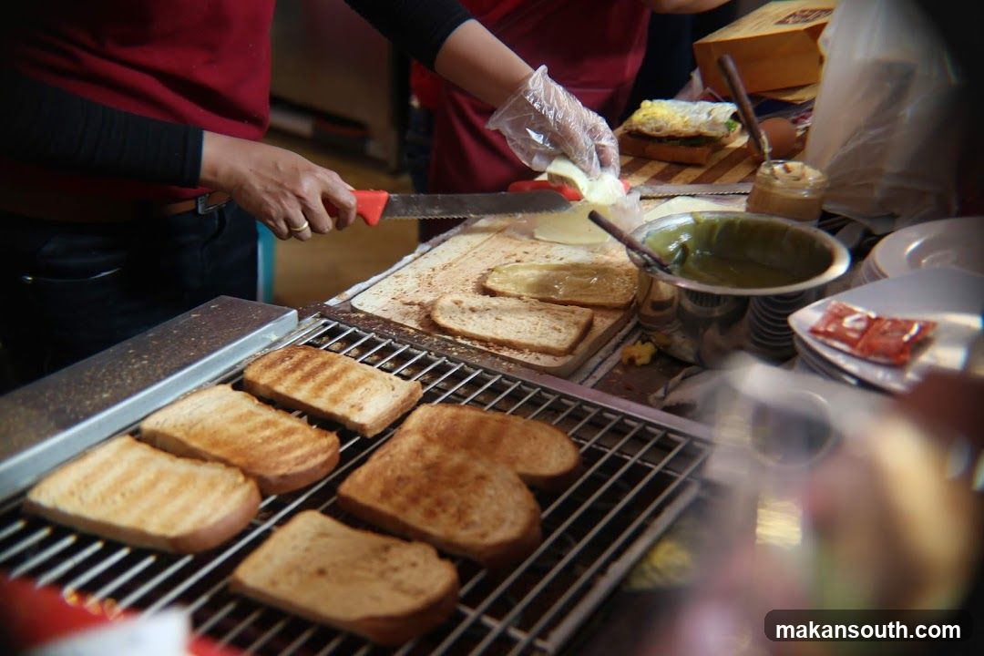 Toast Preparation at a Food Stall