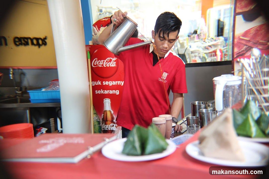 Barista Pouring Drink