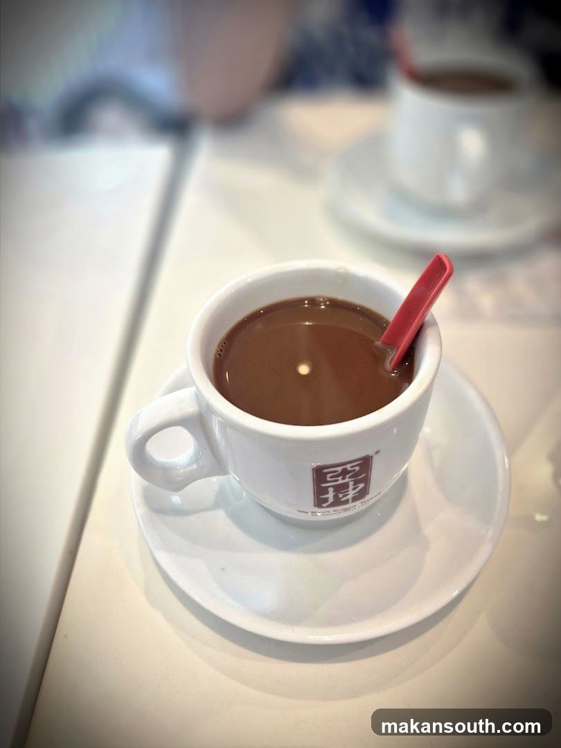 Coffee Cup with Red Spoon