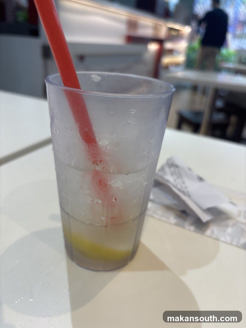 Beverage with straw on table