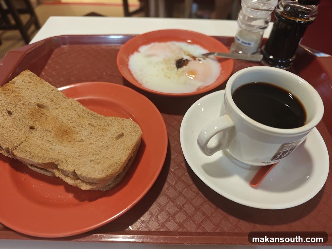 Breakfast Tray with Toast, Eggs and Coffee