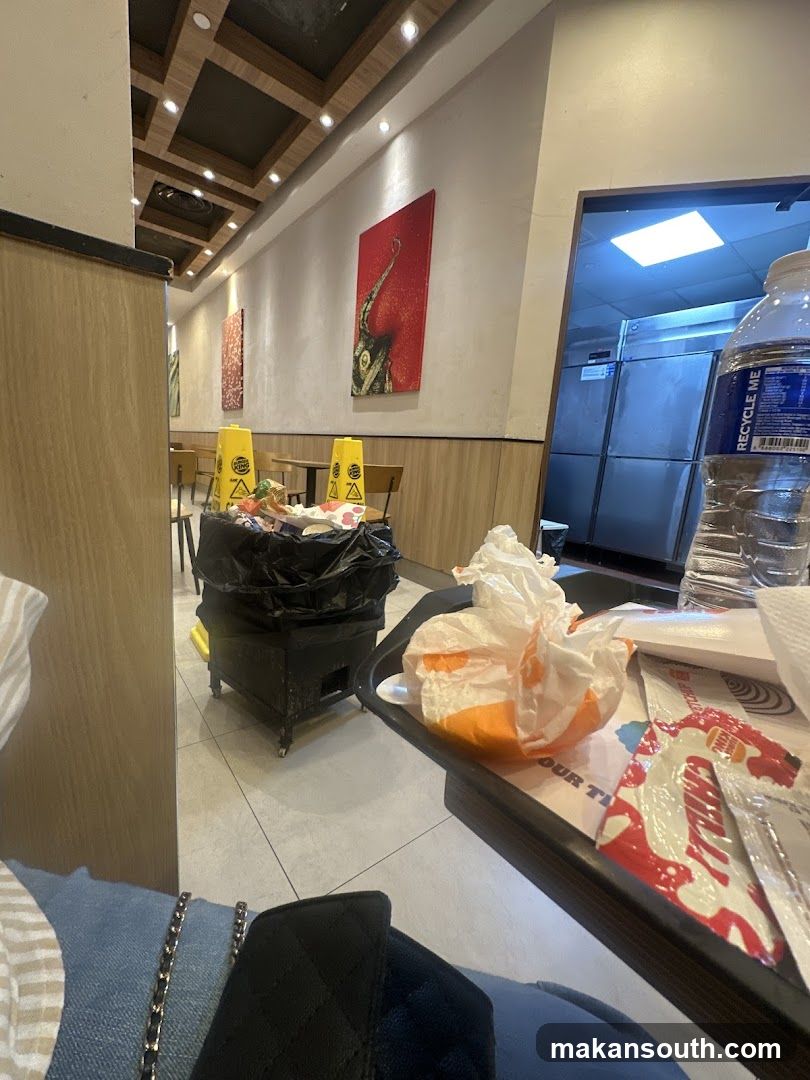 Restaurant Interior with Trash and Food Waste