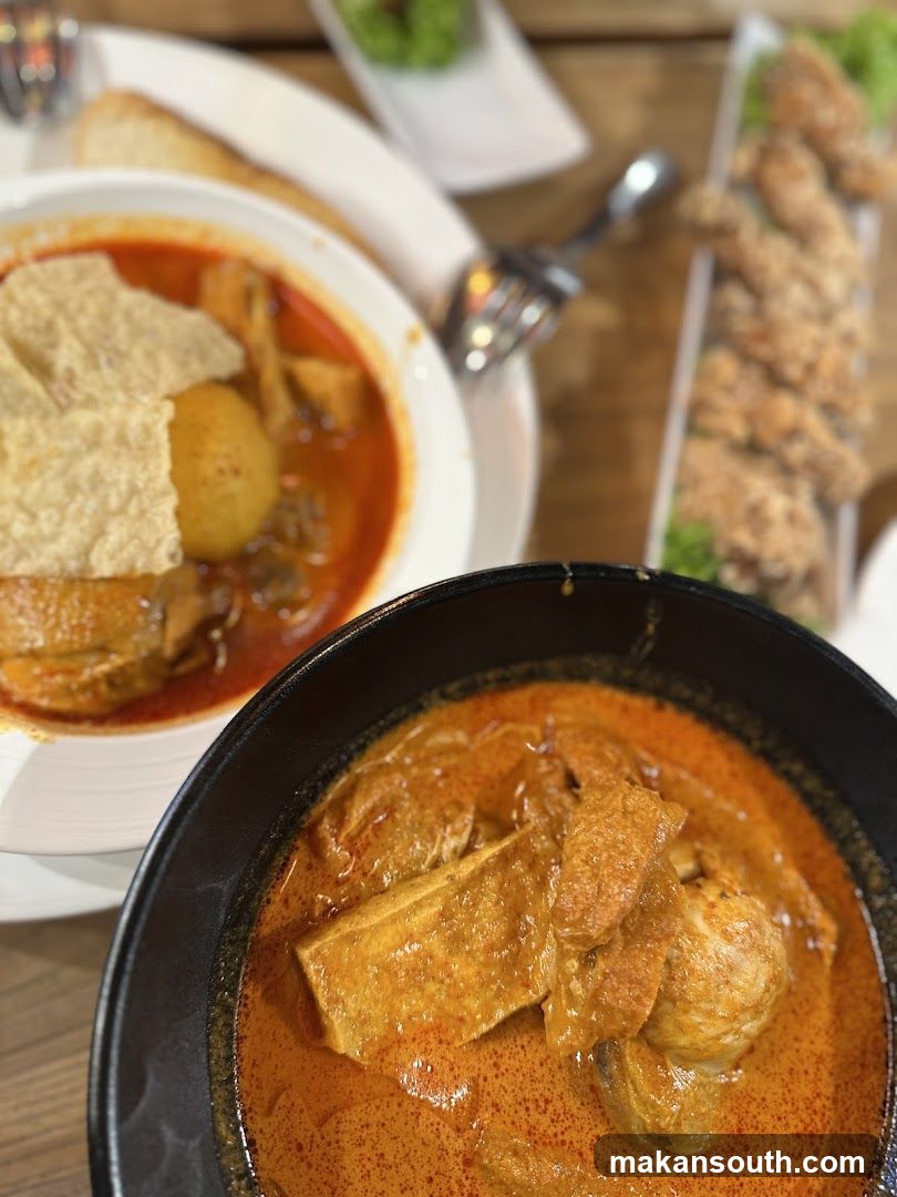 Curry Dishes with Bread and Fried Items