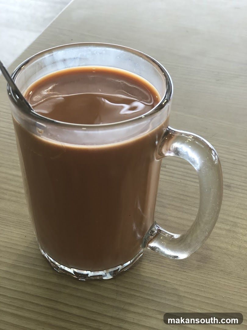 Glass Mug of Tea with Milk