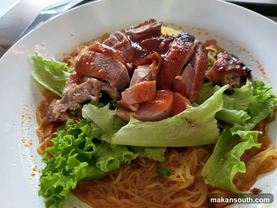 Dish with noodles and roasted meat
