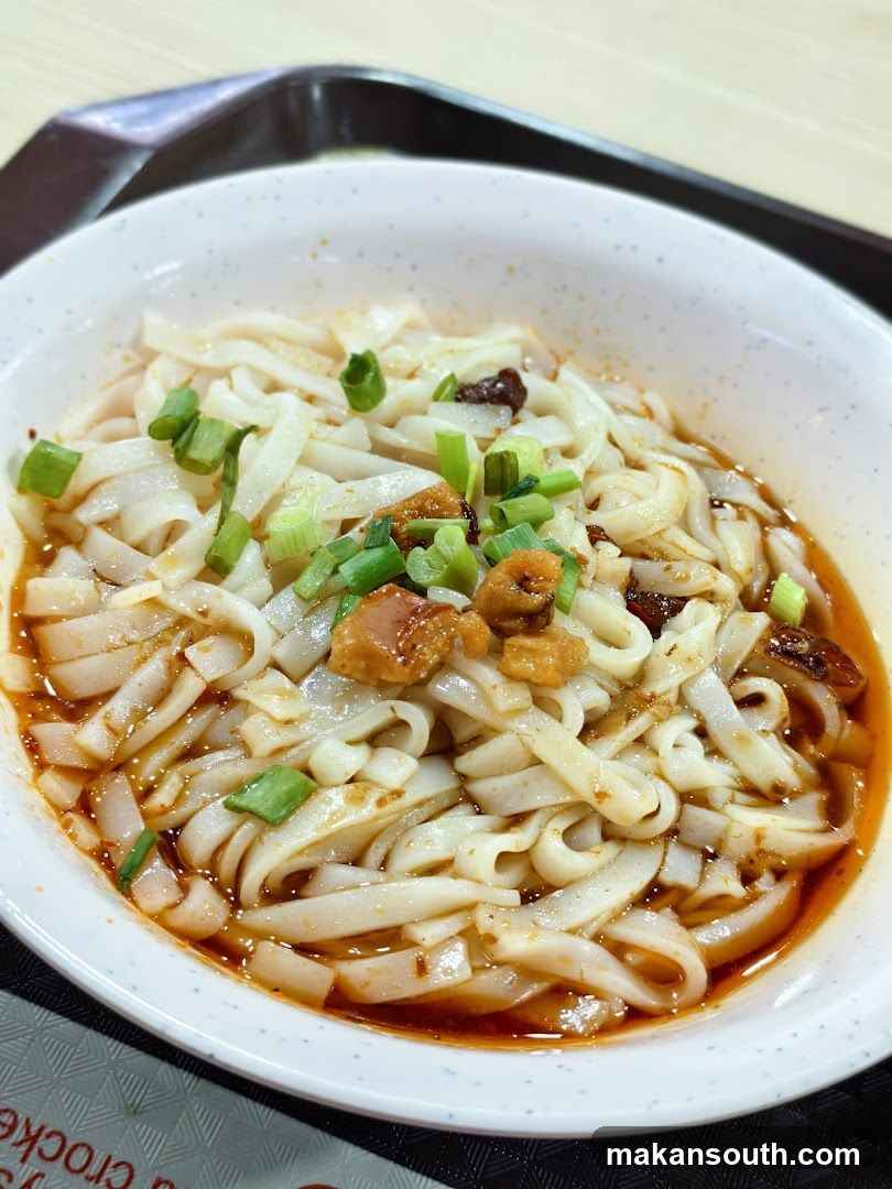 Bowl of Noodles with Broth and Toppings